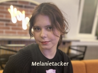 Melanietacker